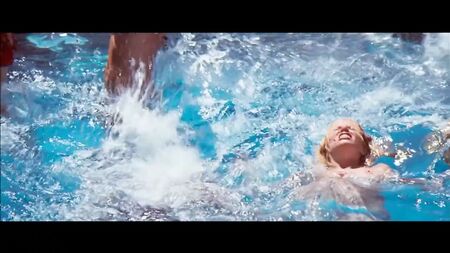 Suzanne Somers seins nus dans une scène à la piscine tirée de « Magnum »