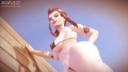 Brigitte nous taquine avec une branlette avec les pieds sur la plage