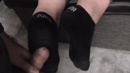 chaussettes noires sales de marque Puma