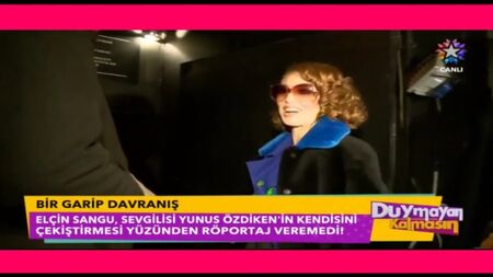 Elçin Sangu n'a pas pu donner d'interview parce que son petit ami, Yunus Özdiken, la tirait par le bras (480 x 854)